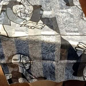 Women's Picasso Printed Scarf. New without tags. 60"L X 13" W. 100% Polyester.